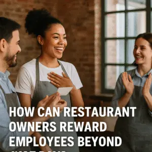 Restaurant employees celebrating recognition; a smiling woman receives a reward card from a colleague while another applauds, symbolizing employee appreciation beyond pay.